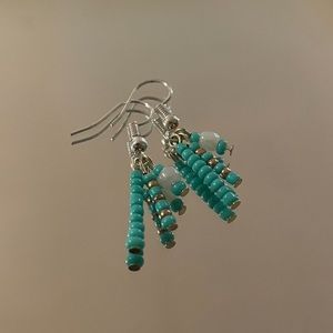 Teal colored beaded earrings